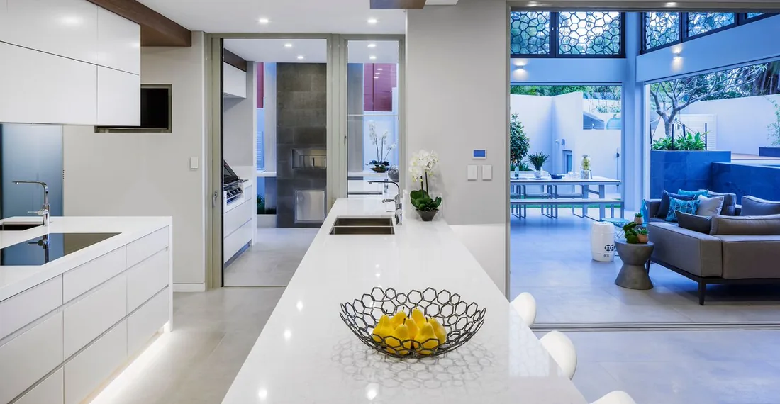 Contemporary residential kitchen opening to an outdoor living area